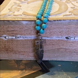 Turquoise and brown cross/feather necklace